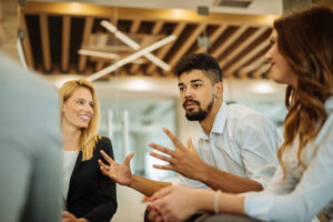 Colleagues having a meeting in a conference room.